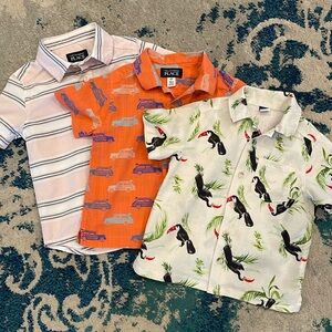 Lot of three short sleeved, button-down boys shirts size 3T. So cute!